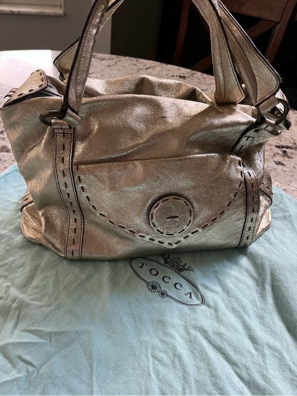 Tocca Gold Leather satchel. Pre-Owned Condition-Fair